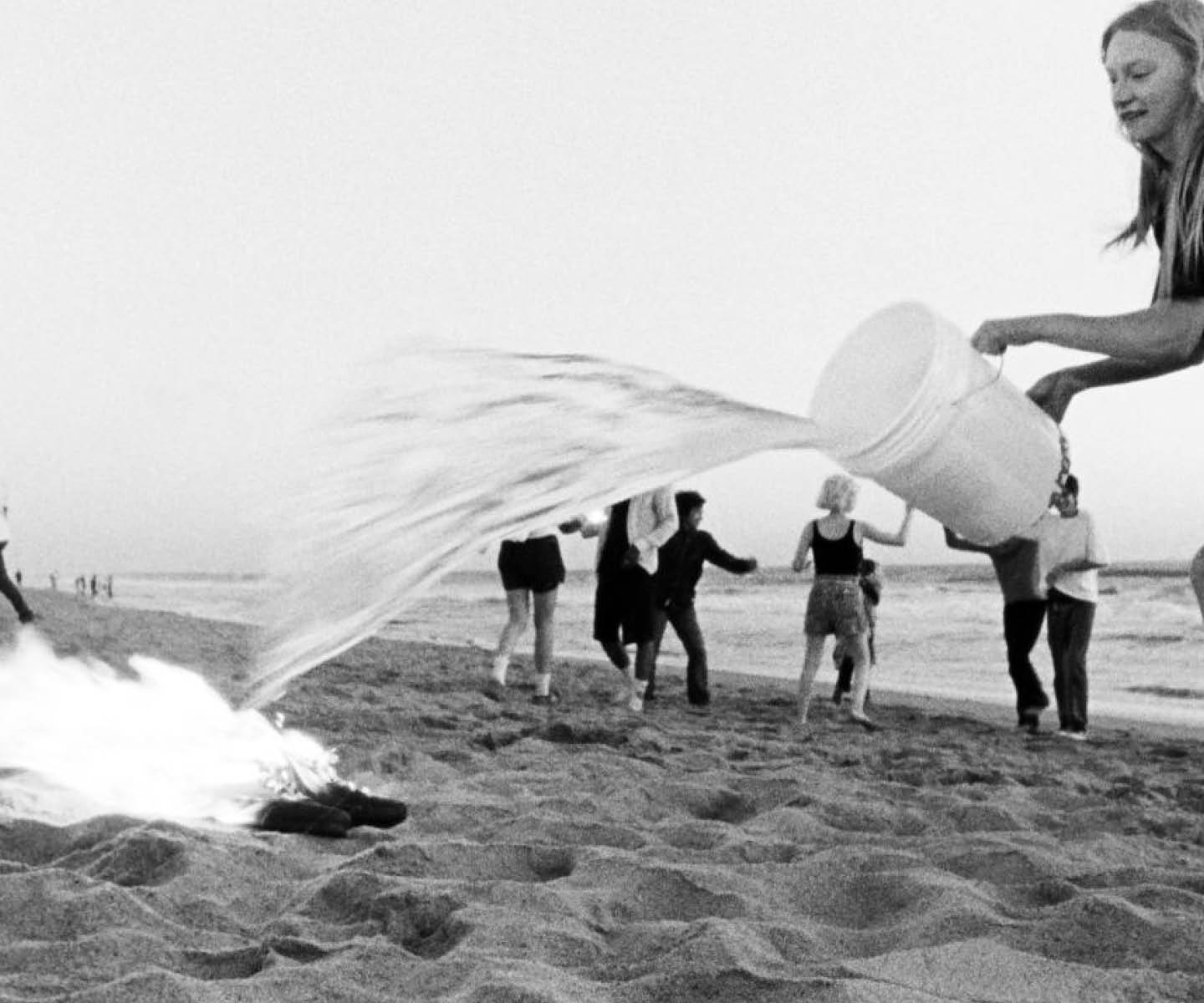 People put water on bonfire