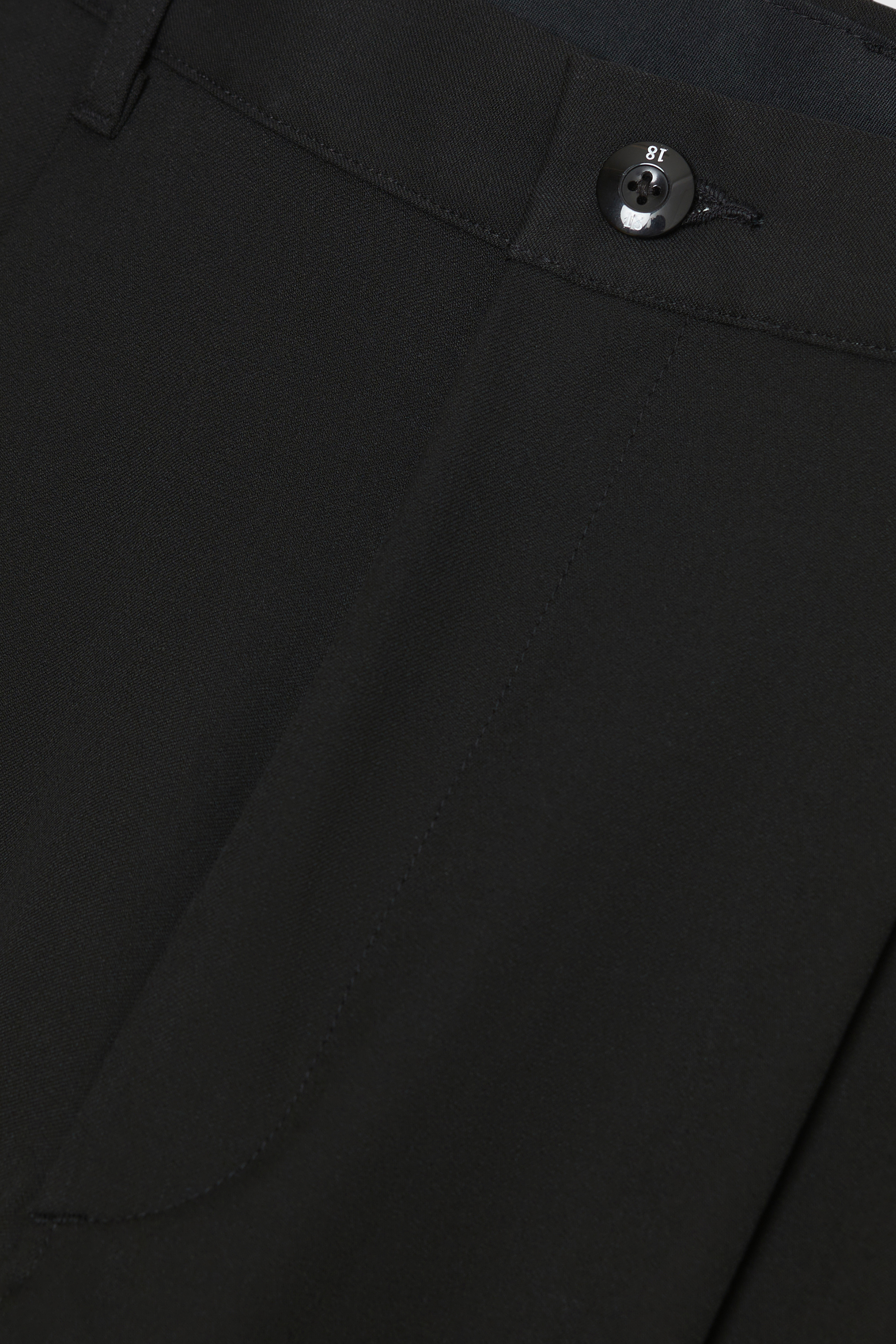 Solid Homme: Black One Tuck Trousers